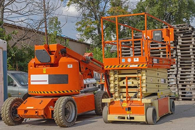 forklift operator transporting heavy loads in a warehouse in Homer Glen